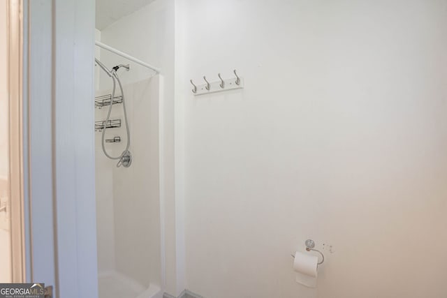 bathroom with a shower