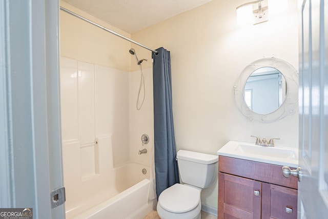 full bathroom with shower / bath combo, vanity, and toilet