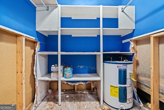 storage room featuring water heater