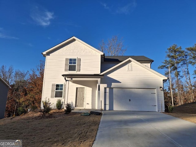 view of property with a garage