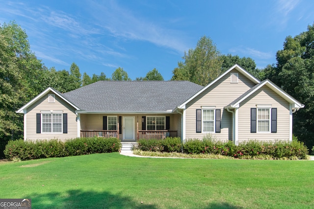 single story home with a front yard and a porch