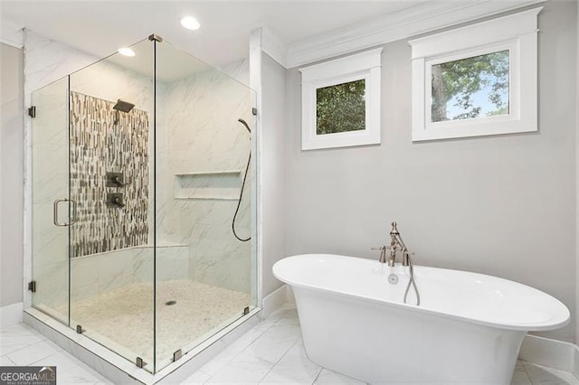 bathroom with separate shower and tub and crown molding