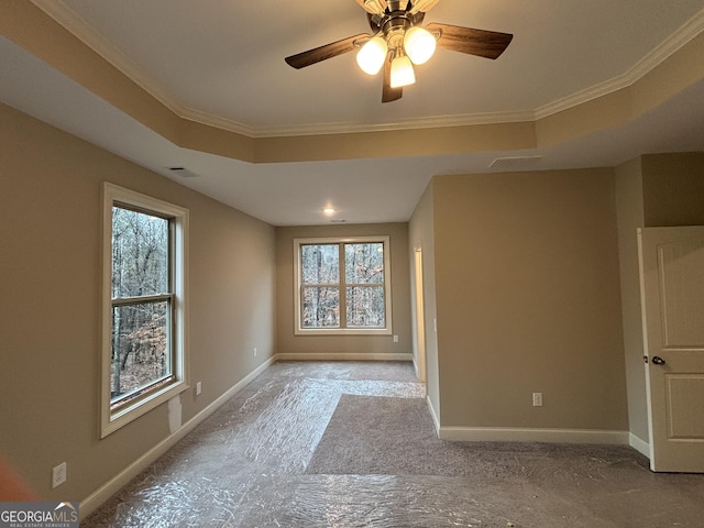 5544 Whispering Swan Ct, Douglasville, GA 30135 - empty room with baseboards, crown molding, a ceiling fan, and a raised ceiling