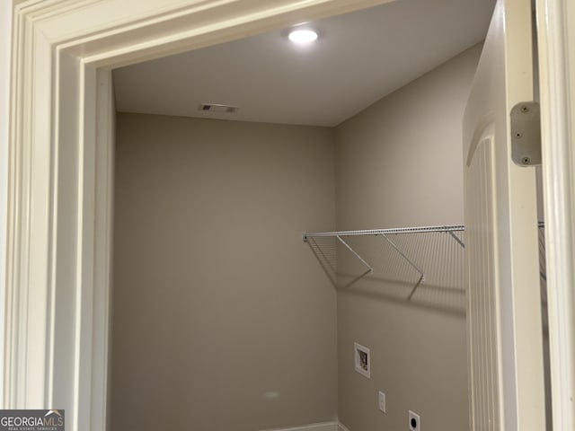 5544 Whispering Swan Ct, Douglasville, GA 30135 - laundry area featuring washer hookup and baseboards