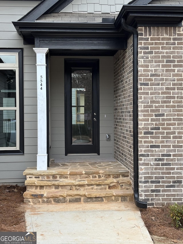 5544 Whispering Swan Ct, Douglasville, GA 30135 - entrance to property with brick siding and covered porch