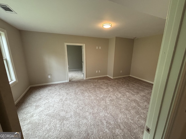 5544 Whispering Swan Ct, Douglasville, GA 30135 - carpeted empty room featuring baseboards