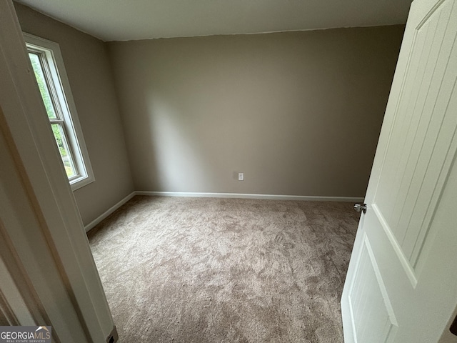 5544 Whispering Swan Ct, Douglasville, GA 30135 - carpeted spare room featuring baseboards