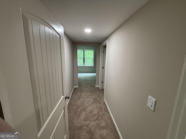 5544 Whispering Swan Ct, Douglasville, GA 30135 - hallway featuring carpet floors and baseboards