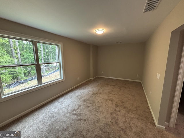5544 Whispering Swan Ct, Douglasville, GA 30135 - carpeted spare room with baseboards