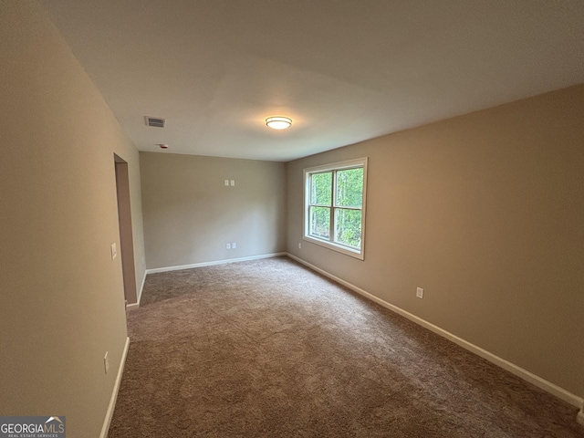 5544 Whispering Swan Ct, Douglasville, GA 30135 - carpeted empty room featuring baseboards
