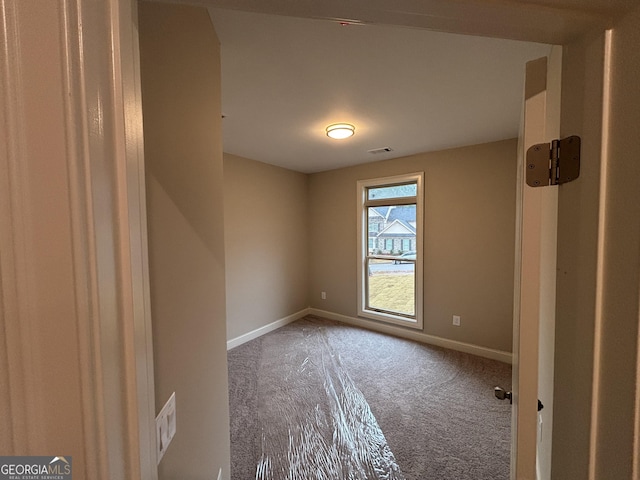 5544 Whispering Swan Ct, Douglasville, GA 30135 - carpeted spare room featuring baseboards