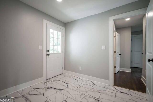 entryway with light wood-type flooring