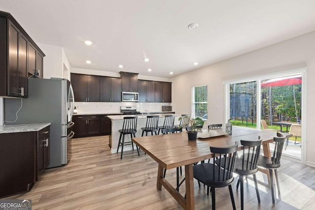 dining room featuring light hardwood / wood-style floors