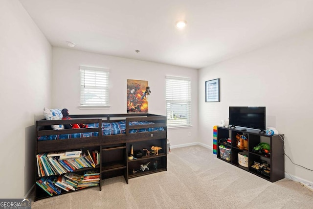 playroom featuring light colored carpet