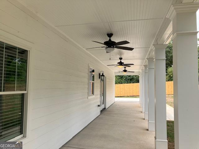 view of patio / terrace with ceiling fan