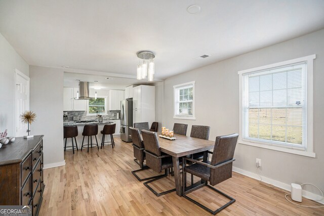 dining area featuring light hardwood / wood-style flooring