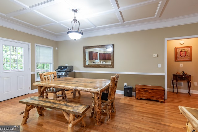 dining room featuring light hardwood / wood-style flooring and coffered ceiling