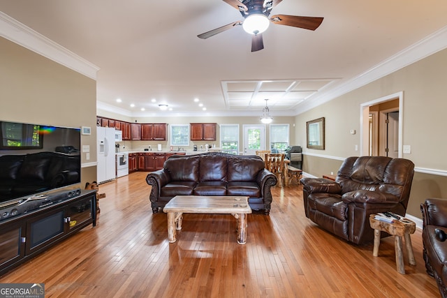 living room featuring ceiling fan, crown molding, and light hardwood / wood-style floors