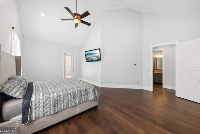 bedroom featuring high vaulted ceiling, dark hardwood / wood-style flooring, ceiling fan, and ensuite bathroom