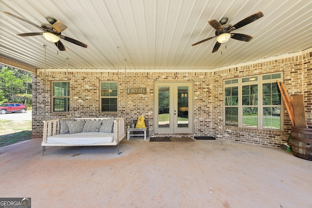 view of patio with ceiling fan and french doors