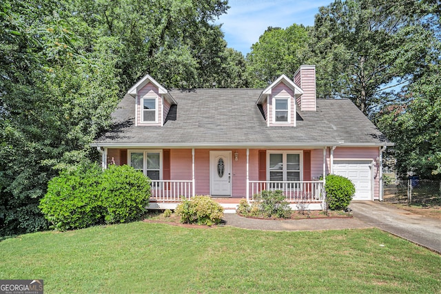 cape cod-style house with a garage, a front lawn, and covered porch