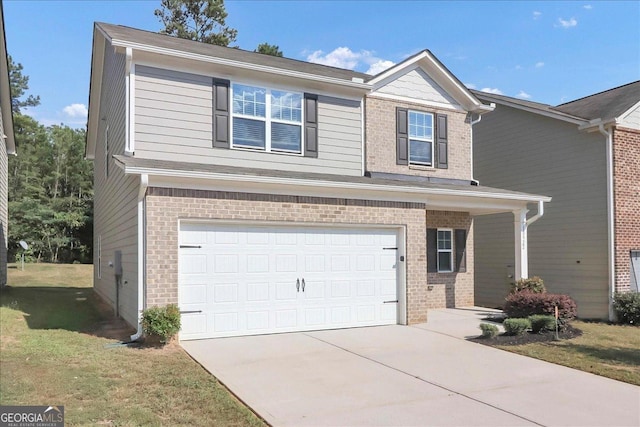 view of front of house featuring driveway, brick siding, an attached garage, and a front yard