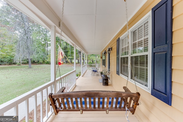 deck featuring covered porch