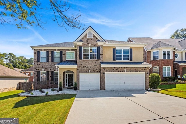 view of front of home with a garage and a front yard