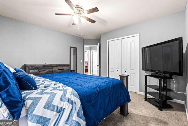 bedroom featuring a closet, carpet, and ceiling fan