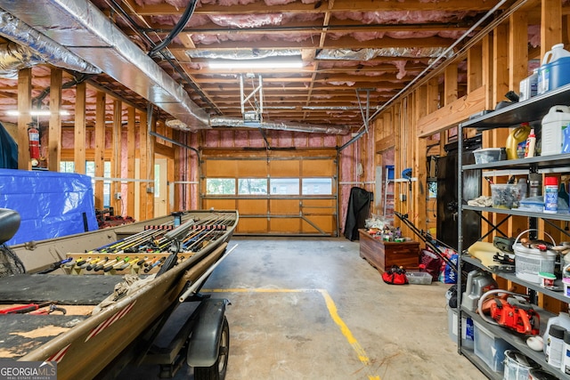 garage featuring a garage door opener