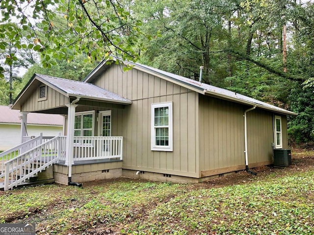 view of home's exterior with central AC