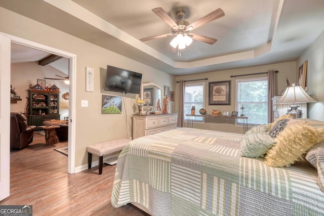 bedroom featuring light hardwood / wood-style floors and ceiling fan