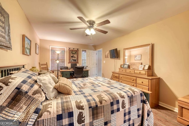 bedroom featuring ceiling fan and light hardwood / wood-style floors