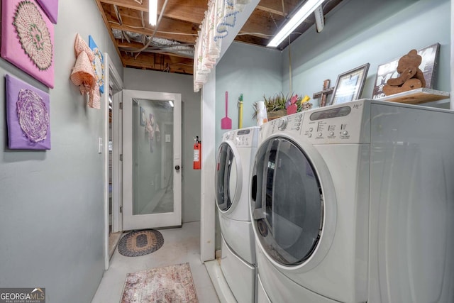 washroom with separate washer and dryer