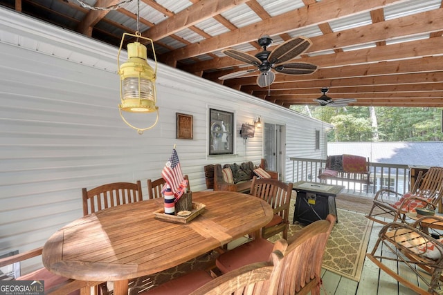 exterior space with ceiling fan