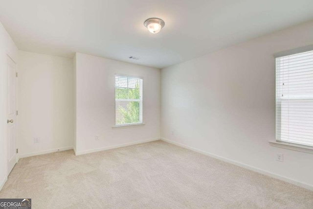 view of carpeted spare room