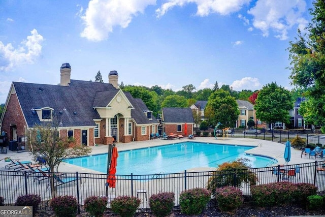 view of swimming pool featuring a patio