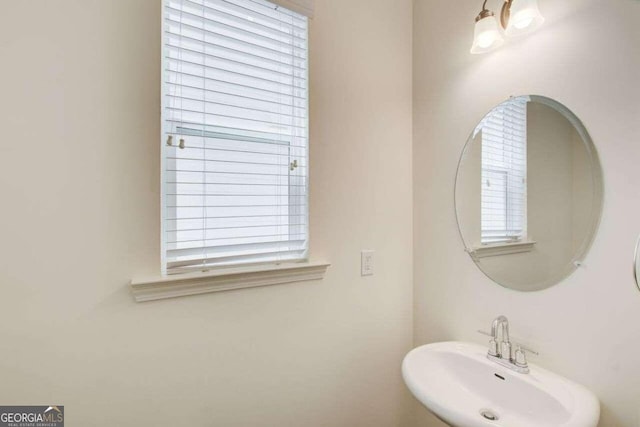 bathroom with a healthy amount of sunlight and sink