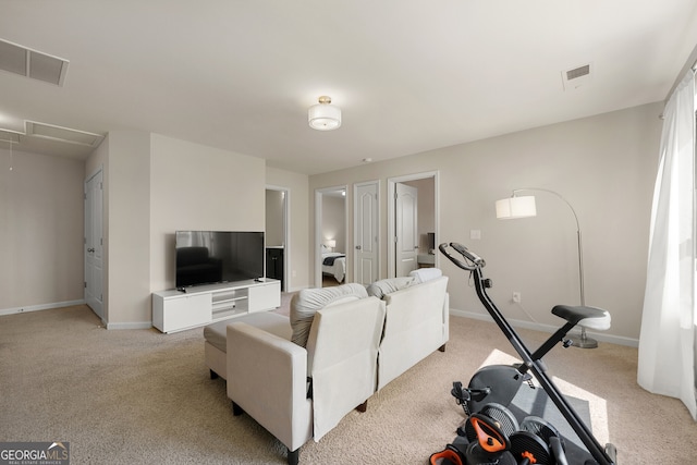 living room with light colored carpet