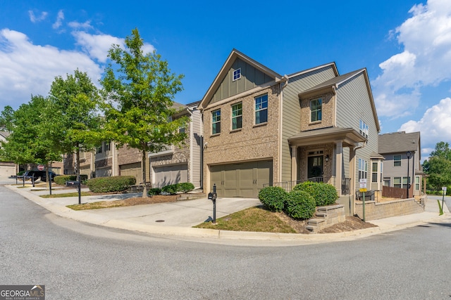 townhome / multi-family property featuring a garage