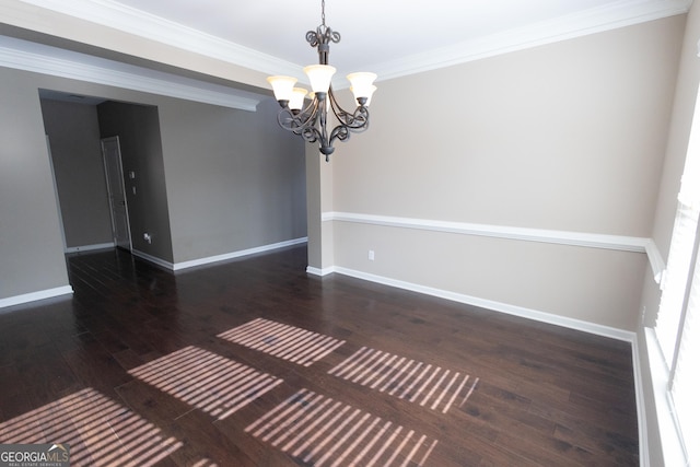 unfurnished dining area with a chandelier, crown molding, and dark hardwood / wood-style floors