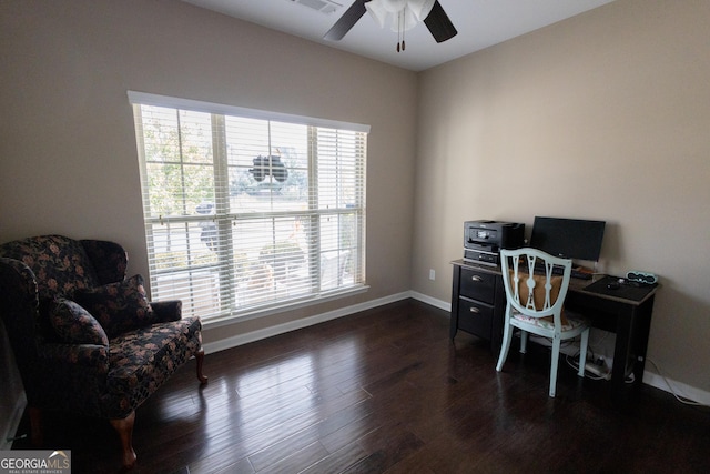 home office with ceiling fan, dark wood-type flooring, and plenty of natural light