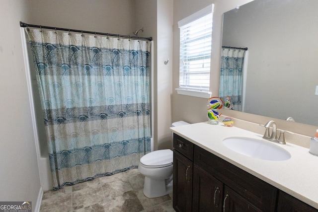 full bathroom with shower / bath combination with curtain, vanity, and toilet