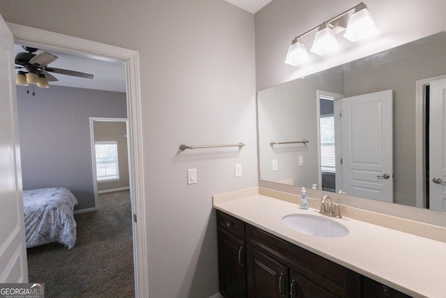 bathroom featuring vanity and ceiling fan