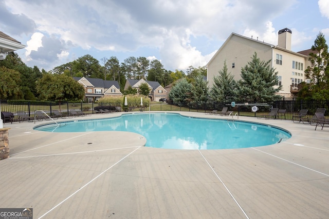 view of pool with a patio area