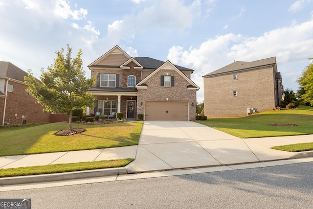 view of front facade with a front yard, a garage, and a porch