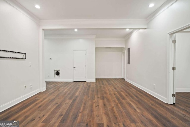 basement with dark wood-type flooring and crown molding