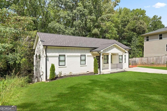 view of front of home with a front yard