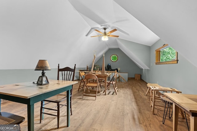 recreation room featuring lofted ceiling, ceiling fan, and light hardwood / wood-style flooring