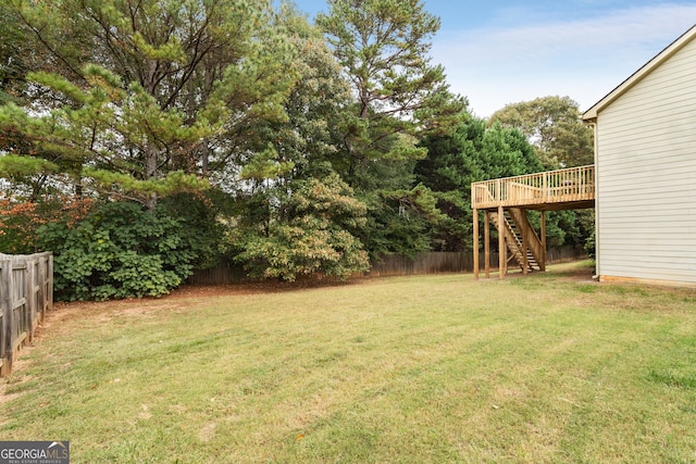 view of yard featuring a deck